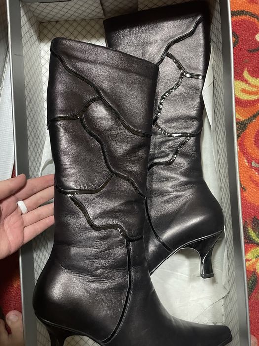 Продам фирменые сапоги