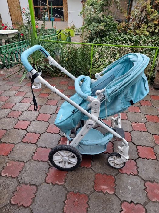 Продам коляску mige