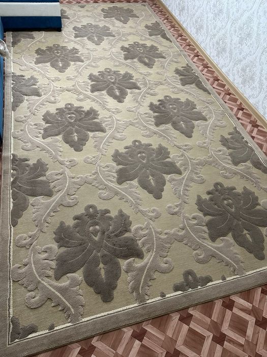 Продам ковёр коричневого цвета