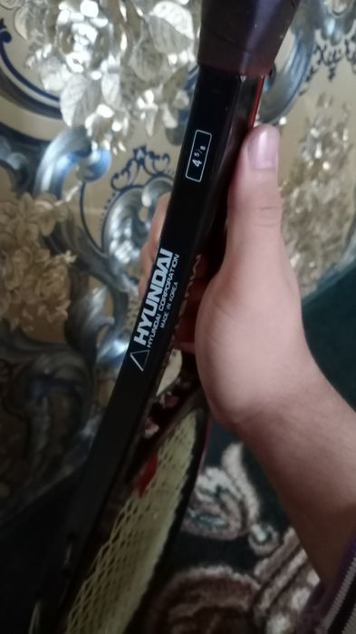 Теннисный ракетка