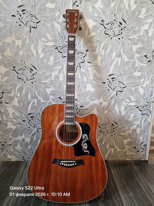 Продам гитару Adadio