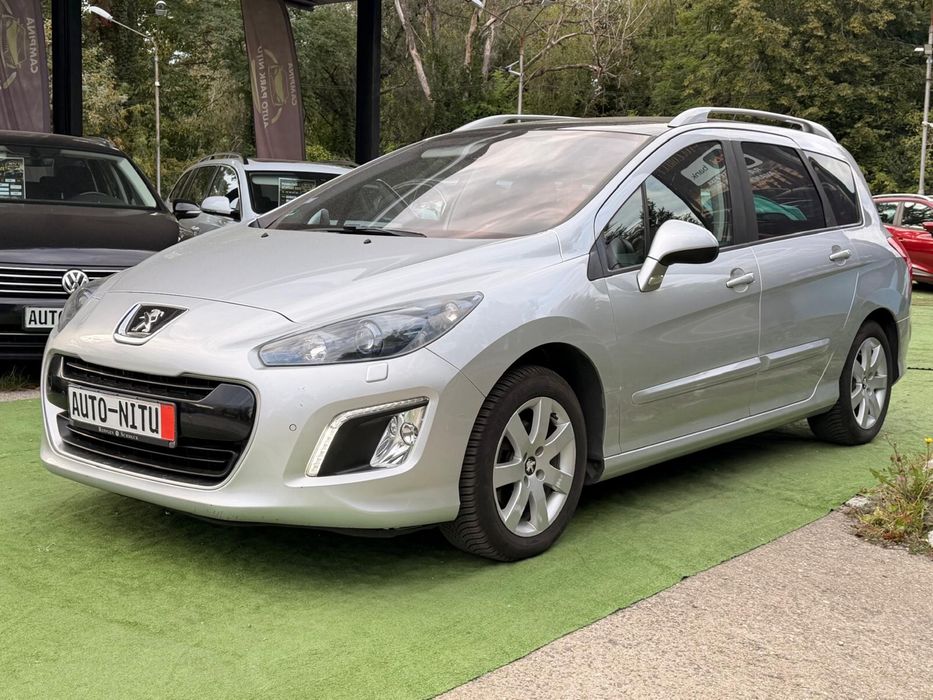 PEUGEOT 308 SW   si in rate