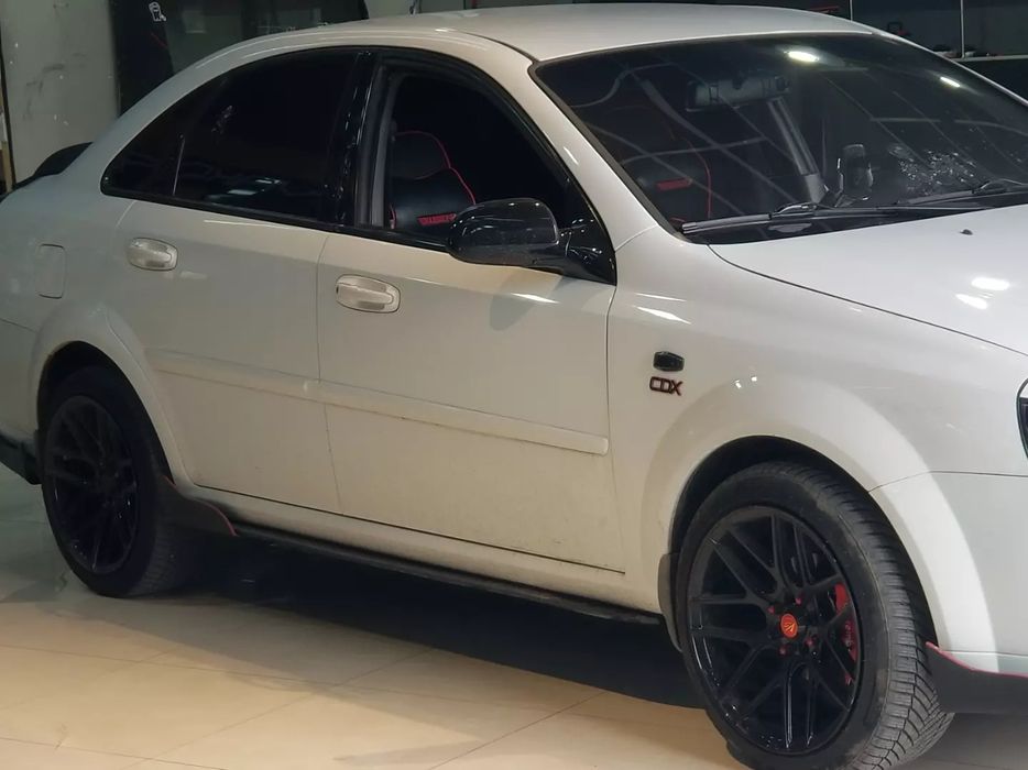 Обвес Lacetti Complekt. Обвес бампера Ласетти.