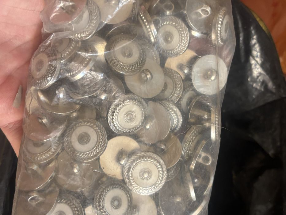 Түйме киім кешектерге