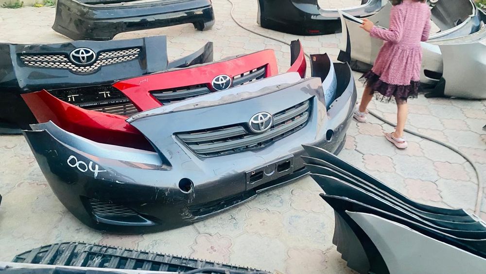 Передний бампер Королла 150