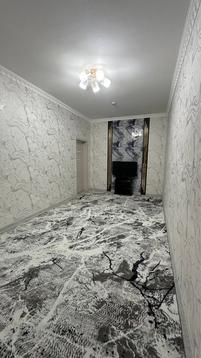 Квартира сотилади янгихает тумани 16 этажка 1- этаж 2 хонали 60 кв