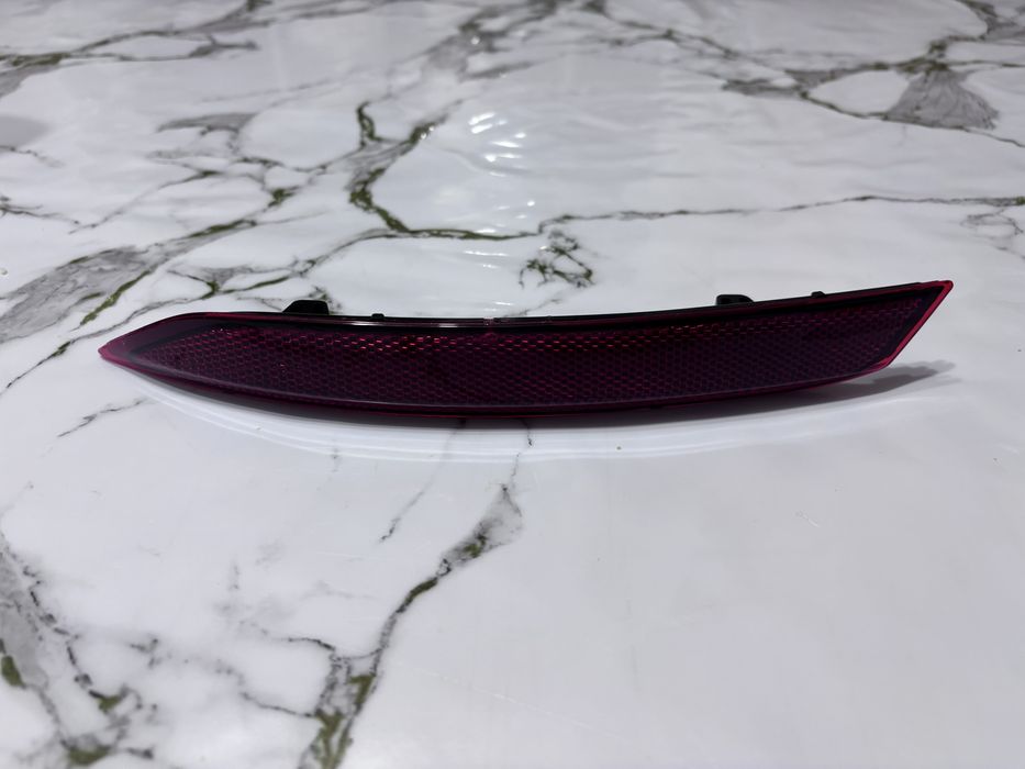 Отражатель на машину флоьсваген поло левая