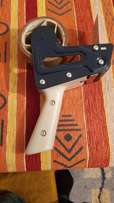 Vand derulator banda adeziva