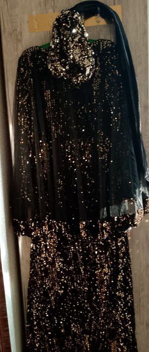 Vecherniy kôylak razmeri 46 yangi rômoli ham bor