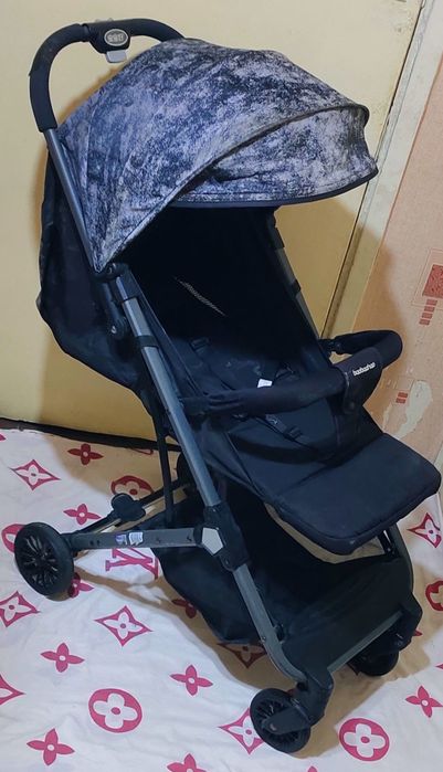 Лёгкая коляска чемодан