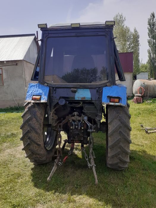 Трактор мтз 80 с плугом