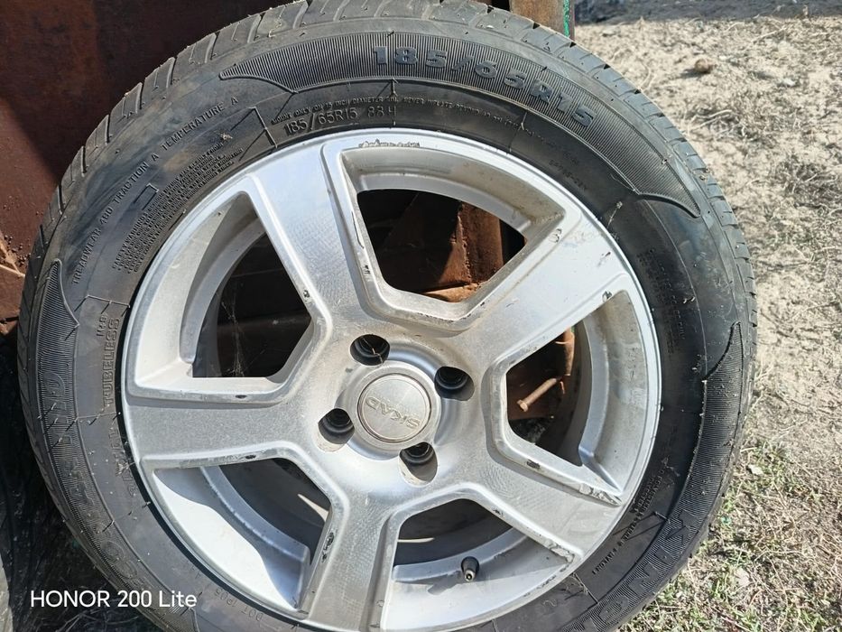 Продам шины с дисками на Volkswagen 200000 комплекте