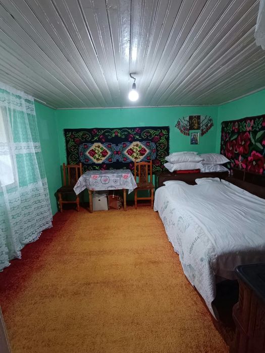 Vând teren +casă bătrânească