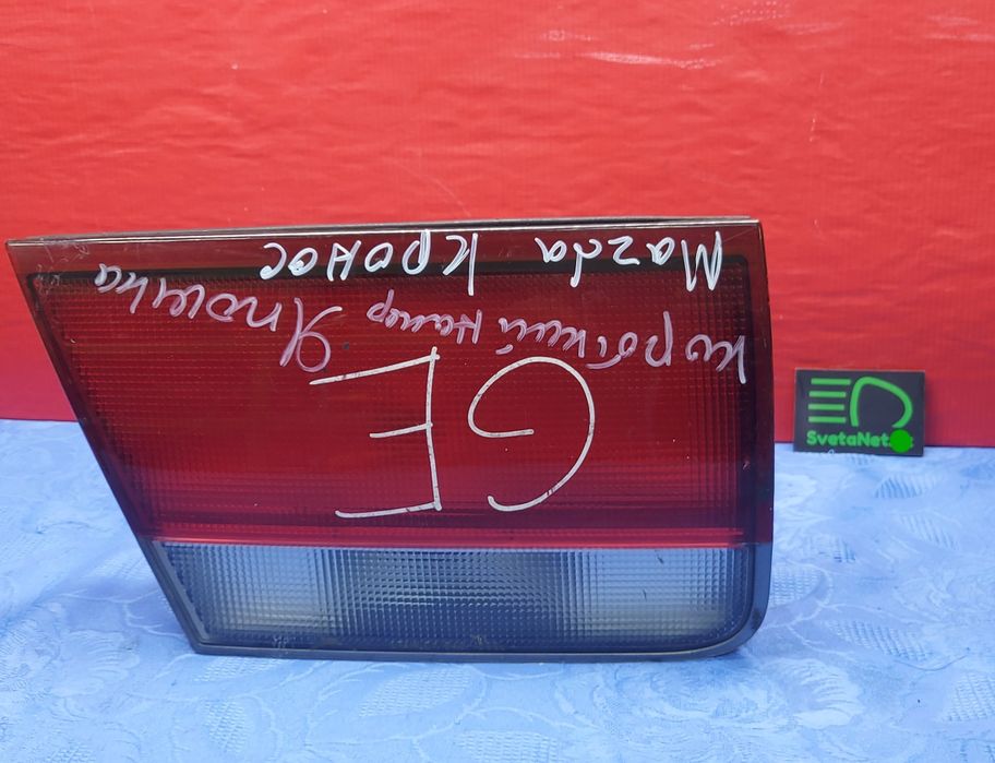 Фонарь задний Мазда Кронос