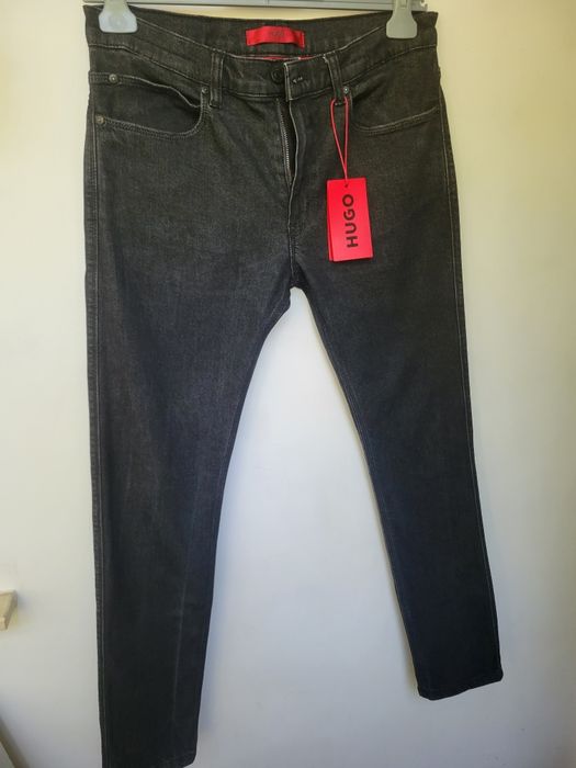 Blugi noi cu eticheta Hugo Boss marimea 32 da merg la S