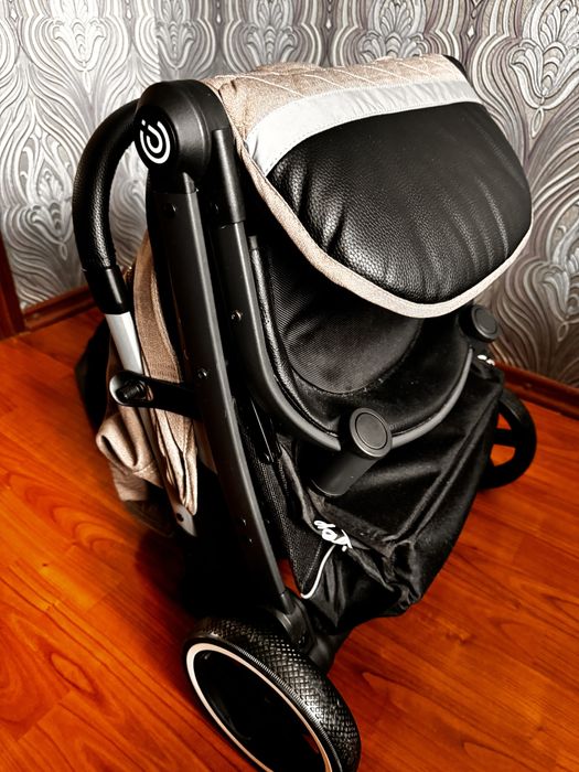 Продам коляску  новую , духовку Асел с связи с перездом