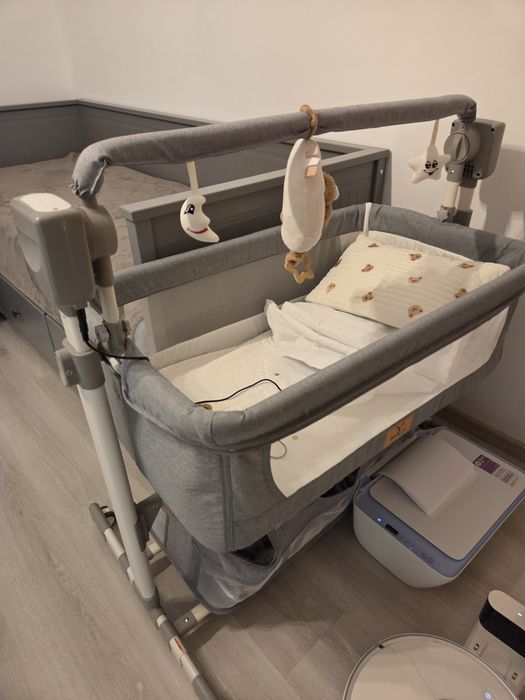 Pătuț copil smart cu autoleganare si muzica