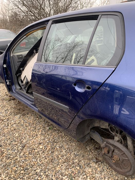 Usa golf 5 ?Fete de usi