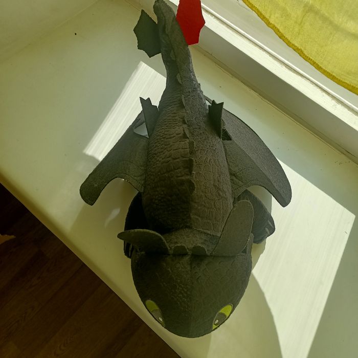 Игрушка в форме дракона