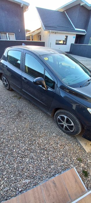 Văd peugeot 308 1.4 benzina
