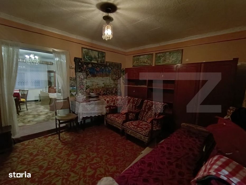 Casa cu 4 camere, baie, bucatarie, anexe, pivnita, teren 1000 mp