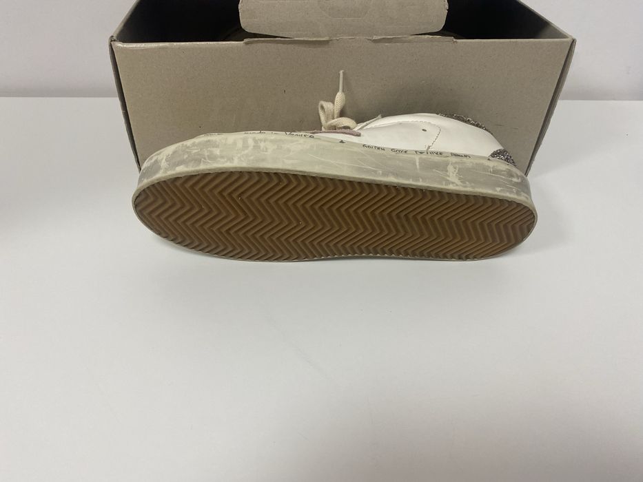 Vând golden goose