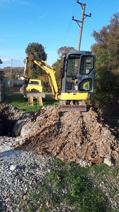Багер,бобкат и самосвал
