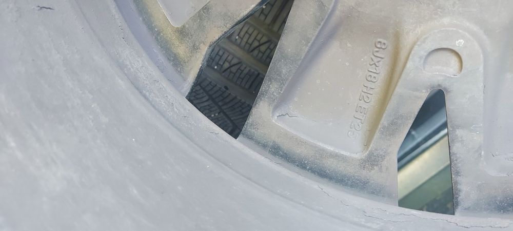 Оригинални гуми с джанти за VW Touareg 235/65R18 110V