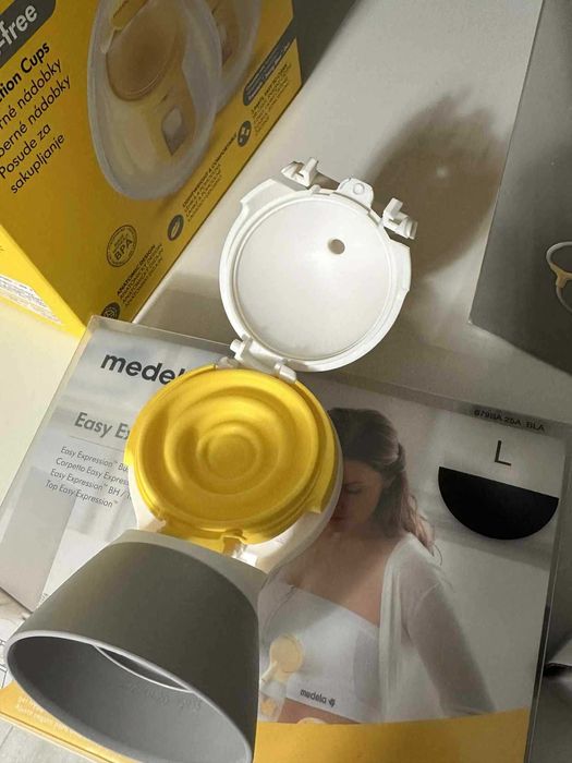 Комплект Medela помпа, чаши, фунии и бюстие