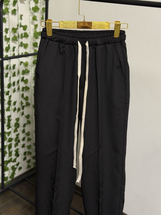 Pantaloni cu snururi Baggy