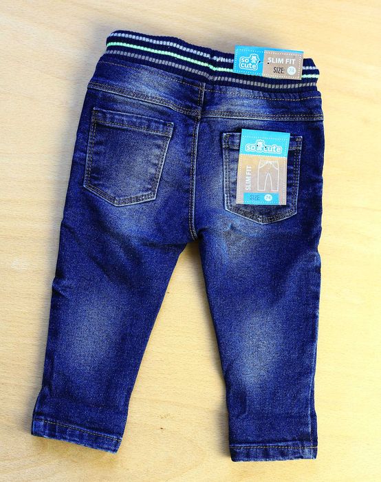 Лот от красиви бебешки дрешки от органичен памук на различни брандове.