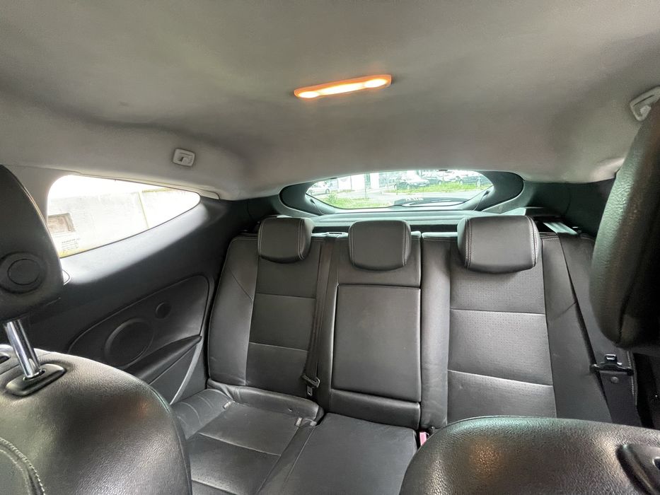 Vand Renault Megane  coupe ,1.4 benzina  a.f.2010