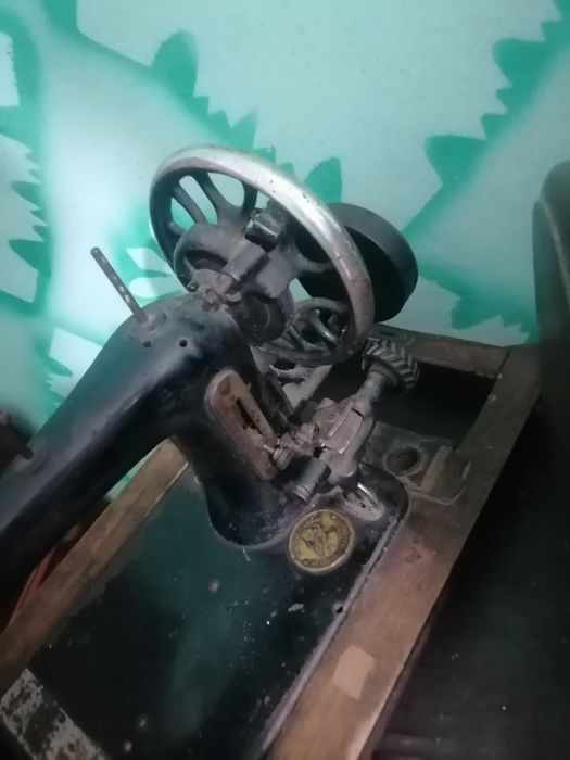 Masina de custut singer