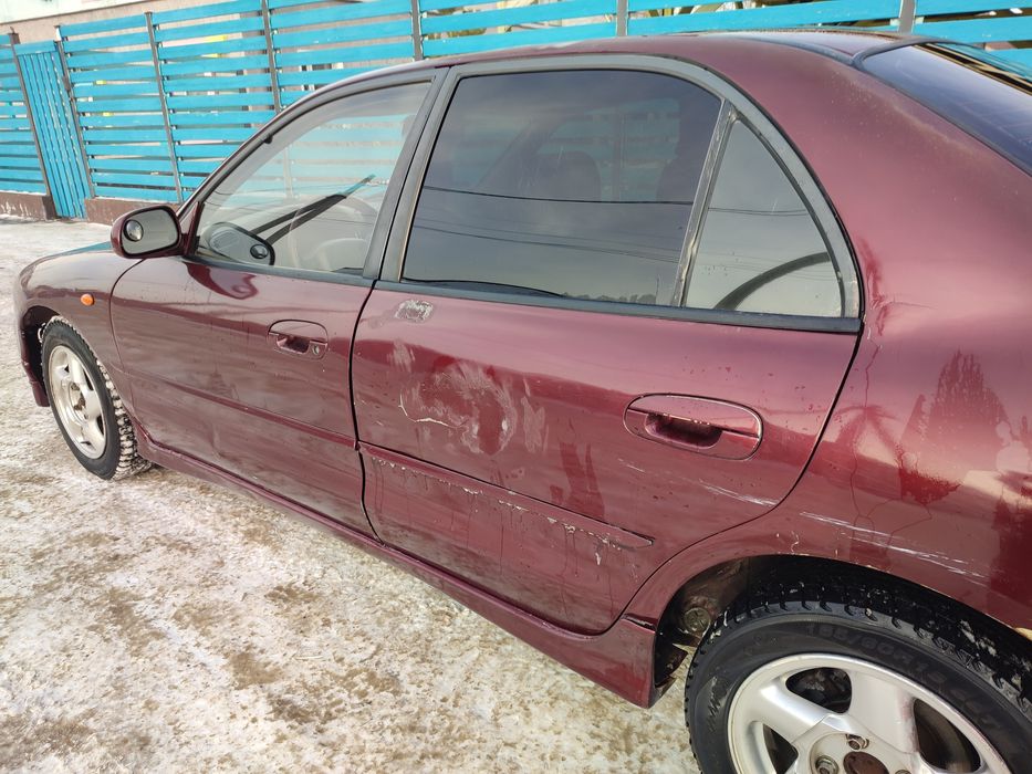 Митсубиси Галант 7 стук двигатель