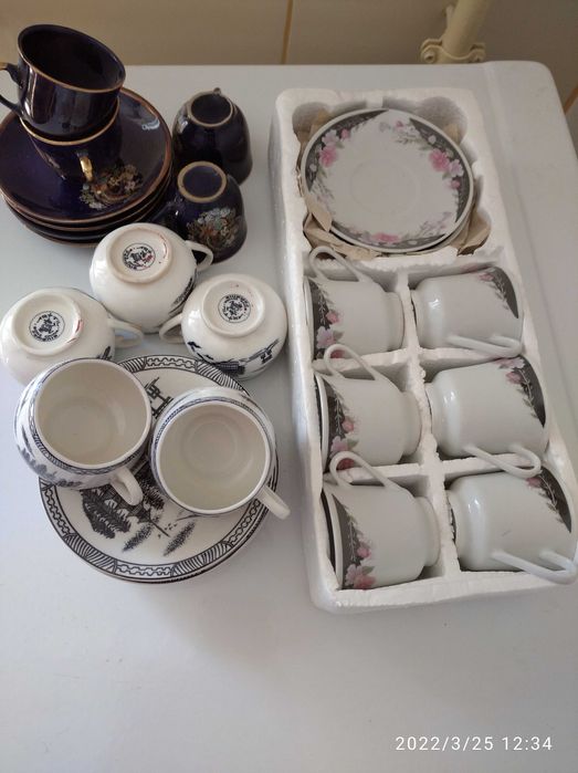 3 seturi de cafea fine porcelain si inca 2
