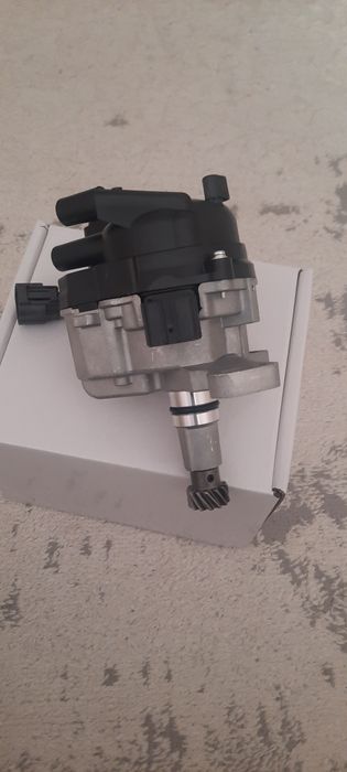 Комутатор , трамблер на Мазду S5.