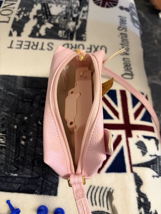 Purse gentuta interactiva pets