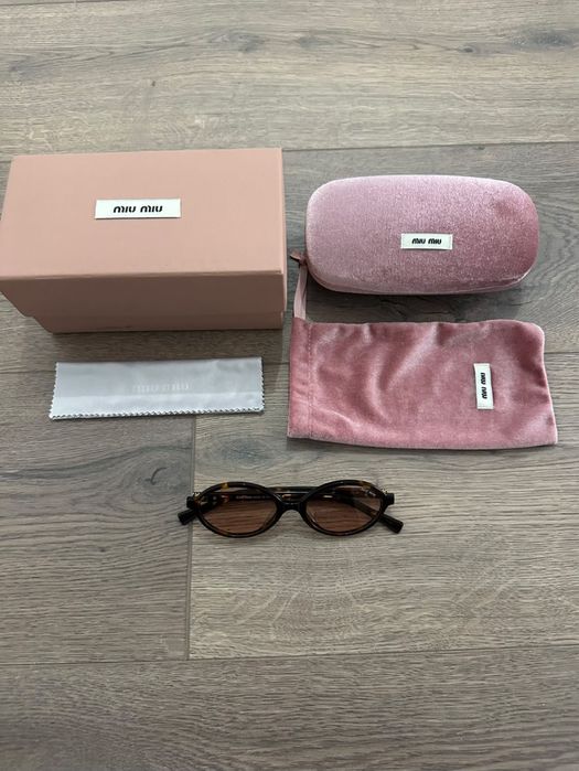 Нови Miu Miu Regard tortoiseshell-effect sunglasses