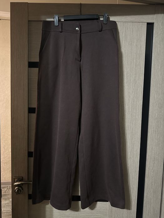 Брюки теплые коричневого цвета новые не носили