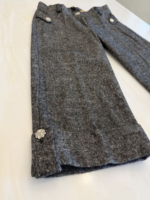 Pantaloni trei sferturi