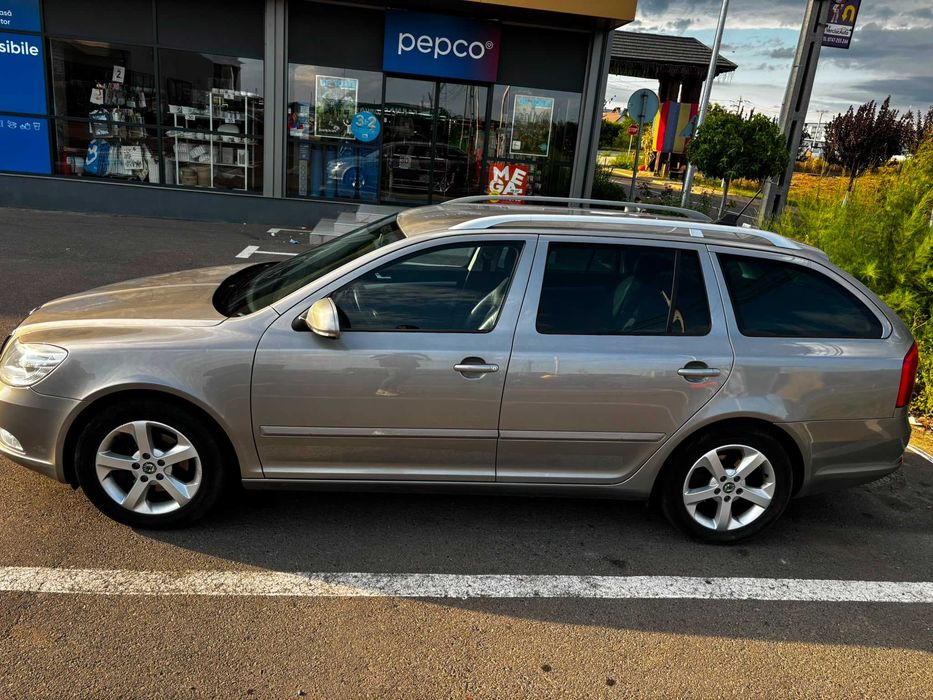 Skoda Octavia II Facelift Combi 2.0 TDI 140 CP | Model 2013 | Cutie manuală 6 trepte. Foarte bine întreținută