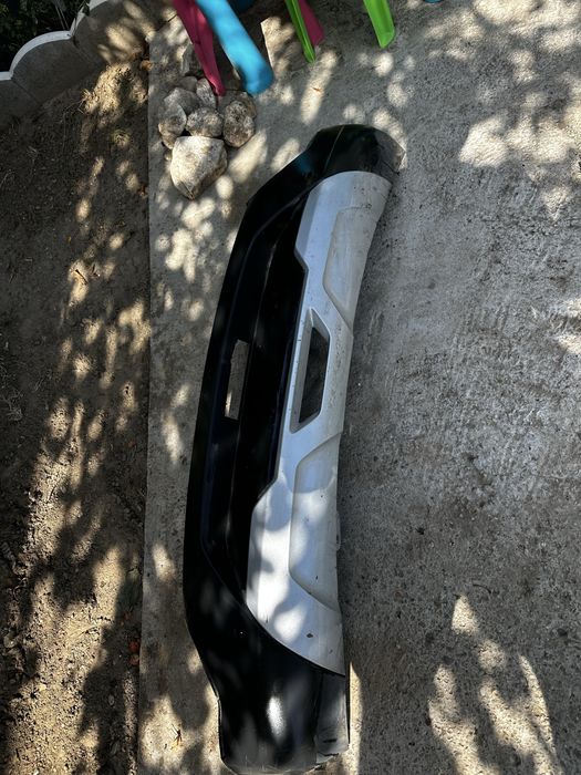 Spoiler bară spate dacia spring.