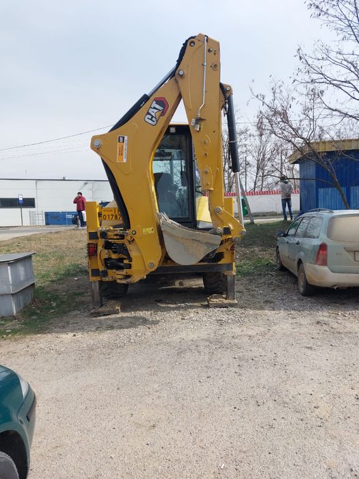 Inchiriere  buldoexcavator Caterpillar 434 roti egale