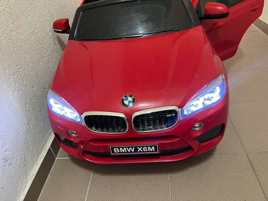 Mașinuța electrică copii