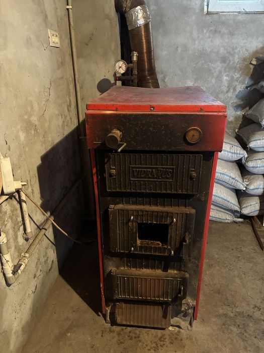 Centrala lemne Vidrarus - usa de sus taiata pentru arzator