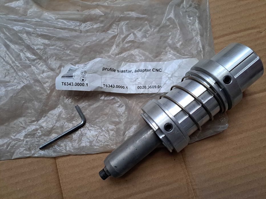 Adaptor pentru mașini CNC