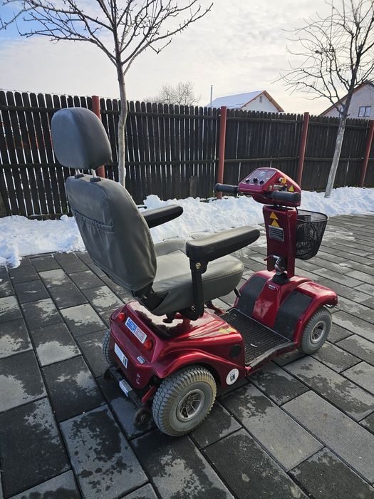 Scuter electric carut scaun persoana cu dizabilitati  Rascal