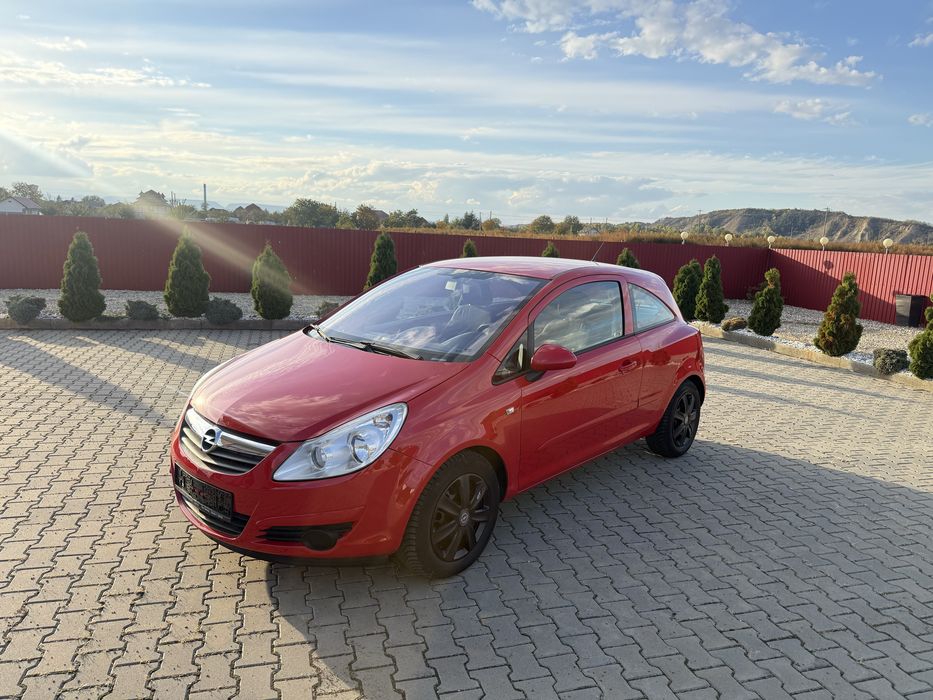 OPEL CORSA D AUTOMATA 1.2 BENZINA 80 CAI EURO 4,climatronic,comenzi volan+Mp3,anvelope noi M+S,recent adusa din Germania,km reali,absolut impecabila