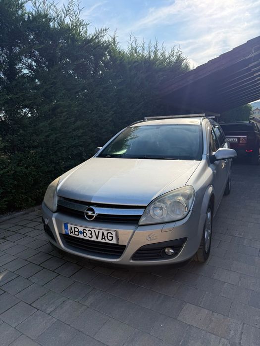 Vand masina opel astra