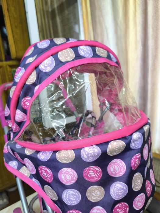 Игрушечная коляска